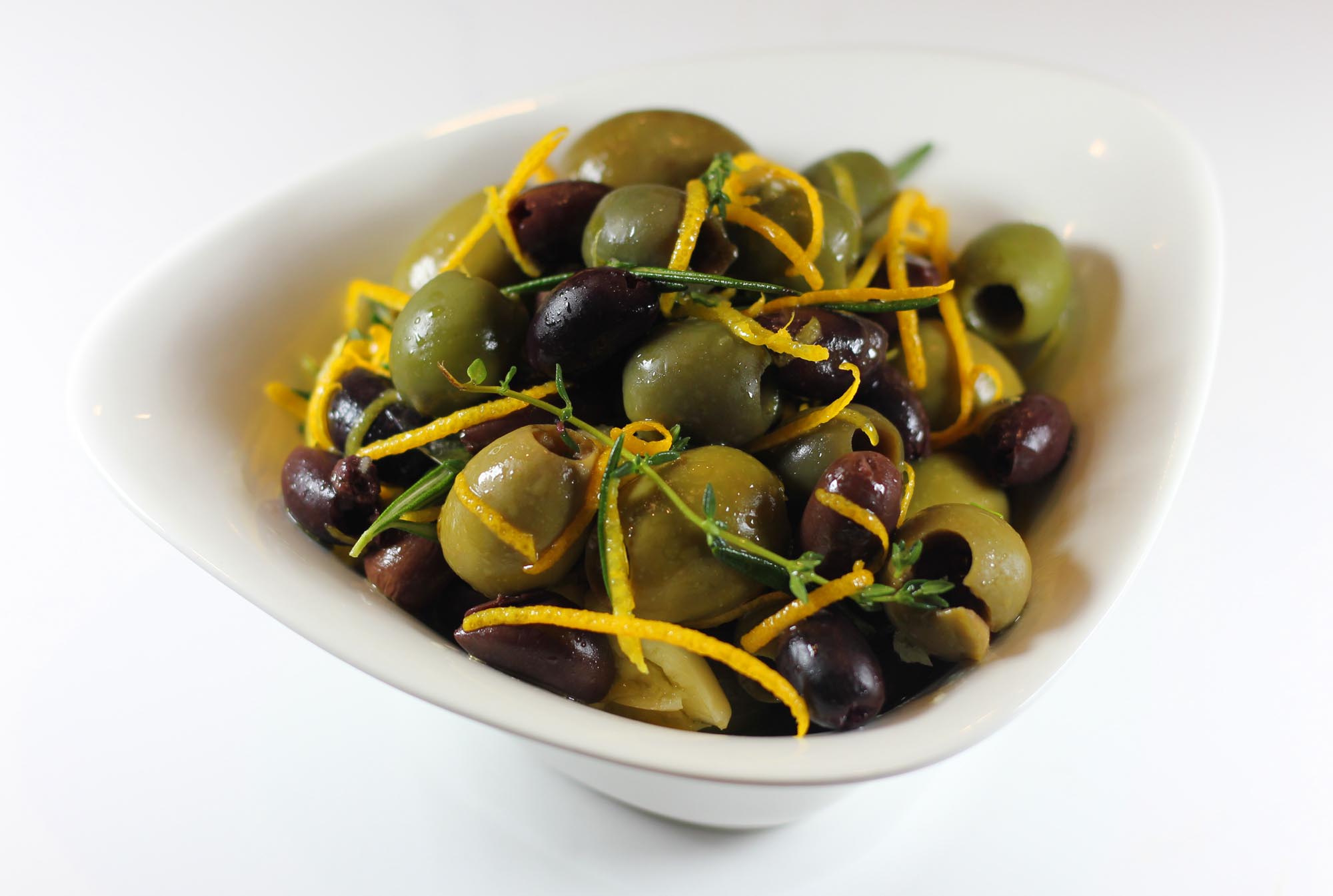 Warm Olives in Garlic, Olive Oil and Zested Orange - Inspired Cuisine