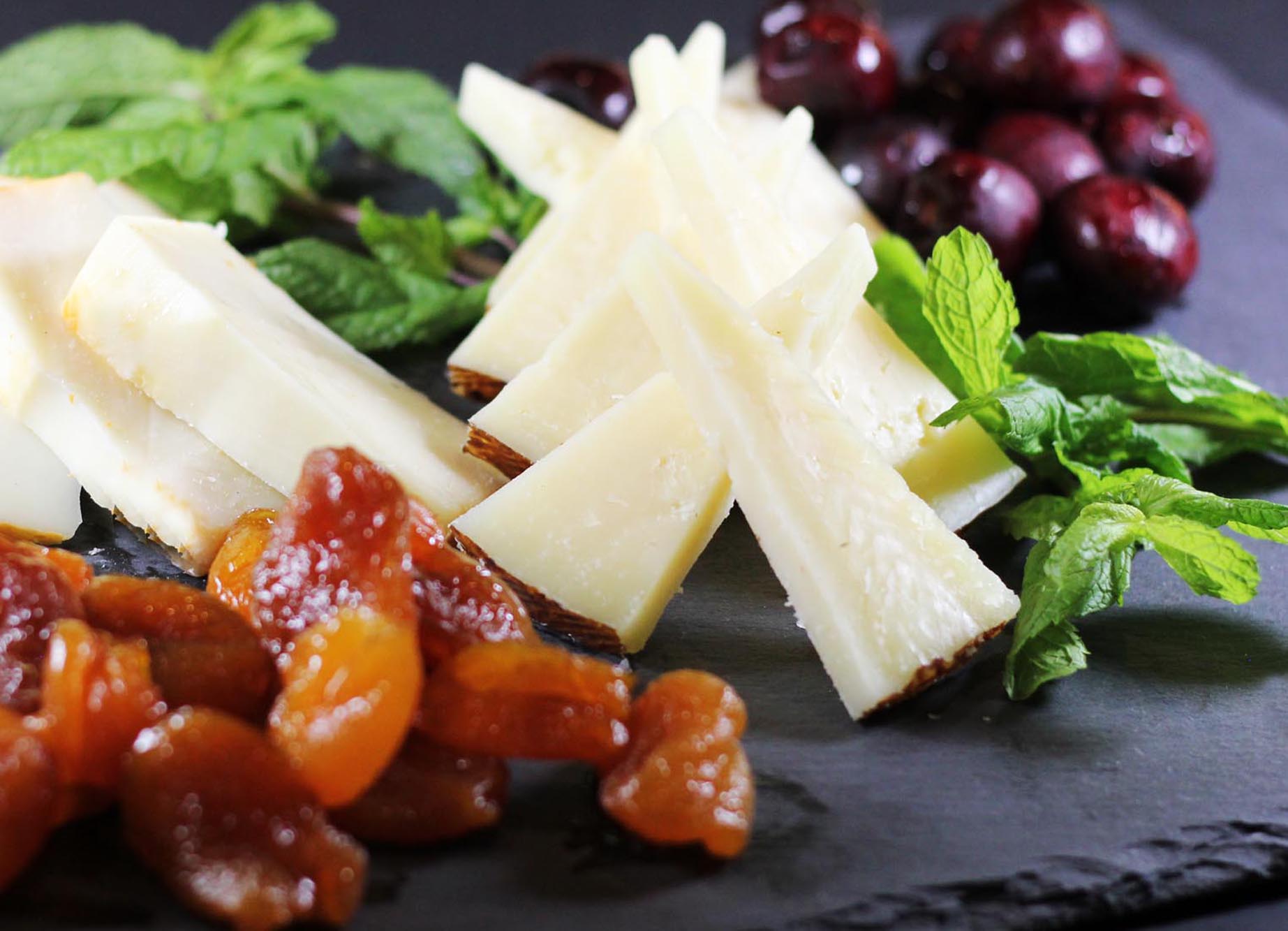 Manchego Cheese with Glazed Apricots and Cherries - Inspired Cuisine