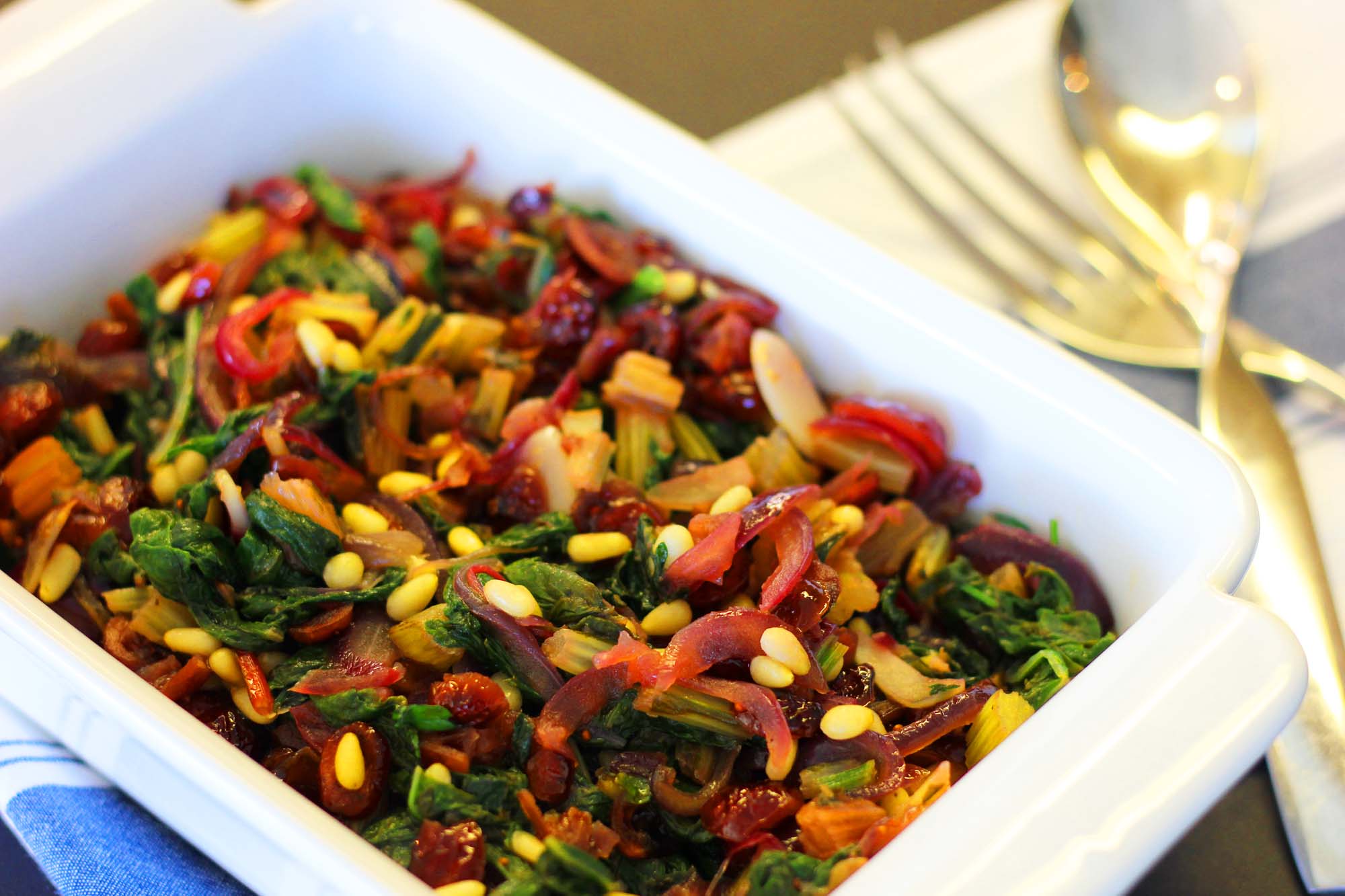Sautéed Rainbow Chard with Pine Nuts and Dried Cranberries - Inspired Cuisine