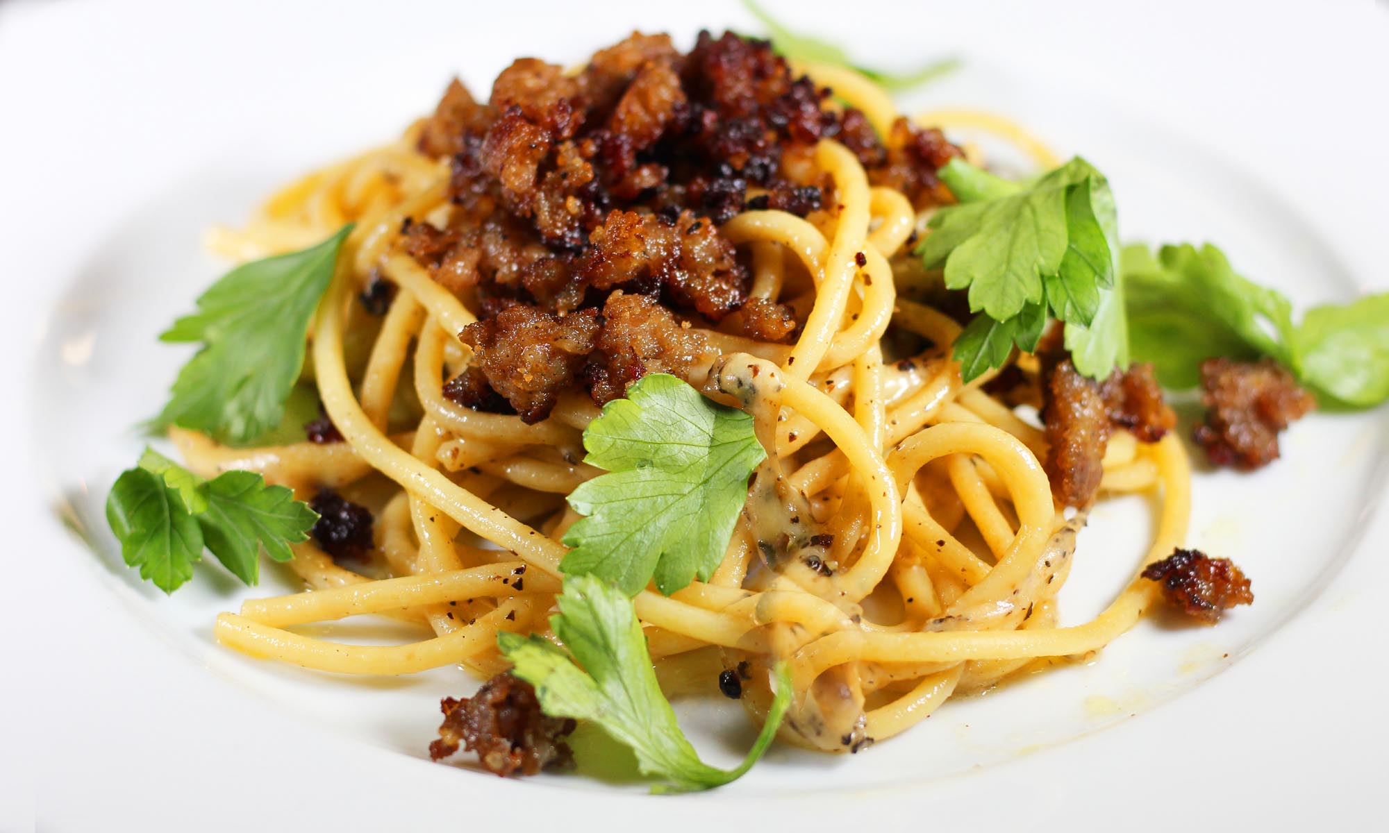Cacio e Pepe with Crumbled Sausage Topping - Inspired Cuisine