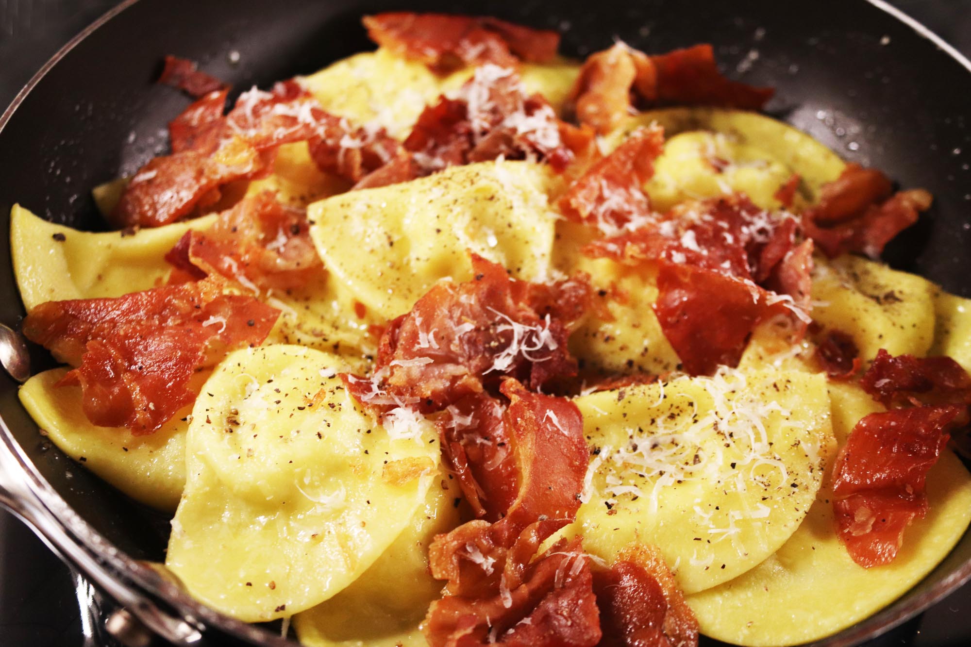 Cacio e Pepe Mezza Luna with Crispy Prosciutto - Inspired Cuisine