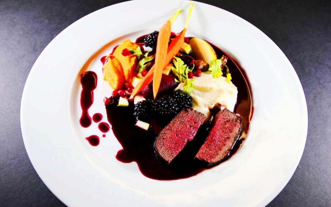 Venison with Roasted Root Vegetables and Red Wine Sauce