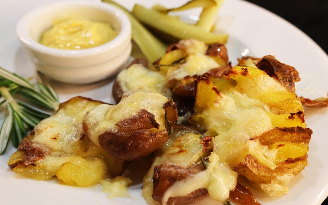 Classic Creamy Raclette on Garlic‑Butter Smashed Potatoes
