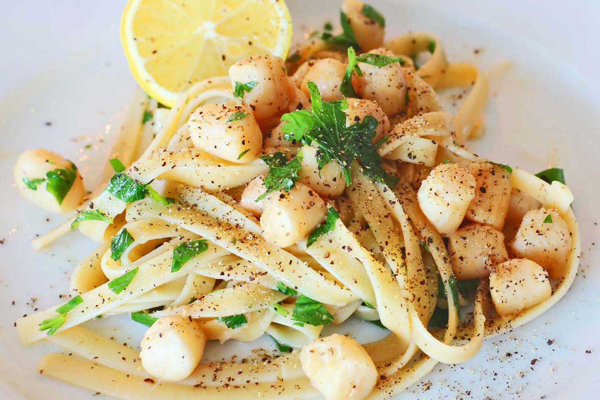Garlic Butter Seared Bay Scallops with Linguine - Inspired Cuisine