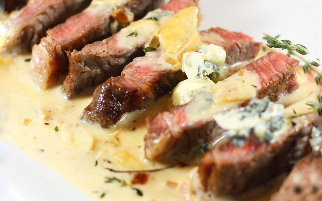 Pan Seared New York Strip with Blue Cheese Cream Sauce